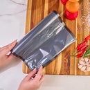 EMBALAGEM 20CMX5CM PARA VACUO EM ROLO GOFRADO PRETA E TRANSPARENTE